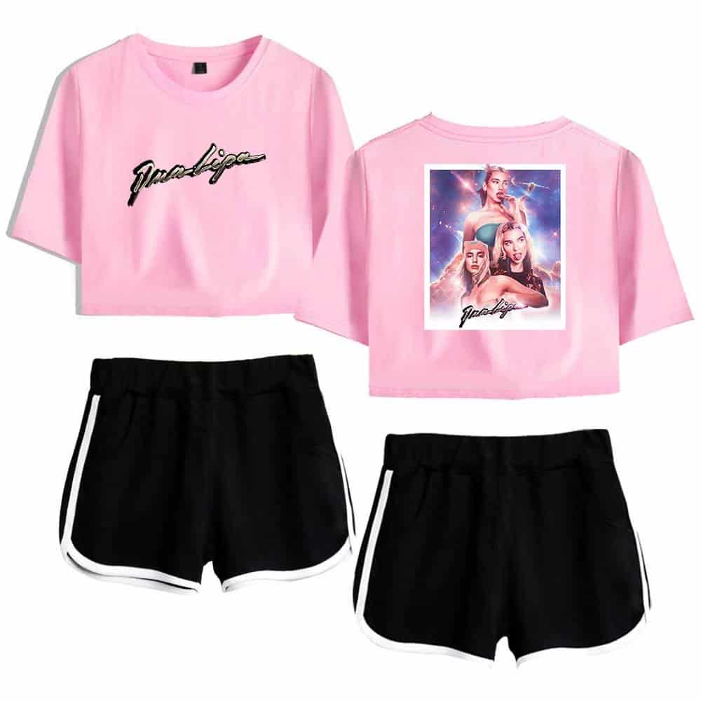 Pink cropped t-shirt with "Jade Licorice" embroidered on the front and a graphic print of three women on the back, paired with black running shorts featuring white trim.