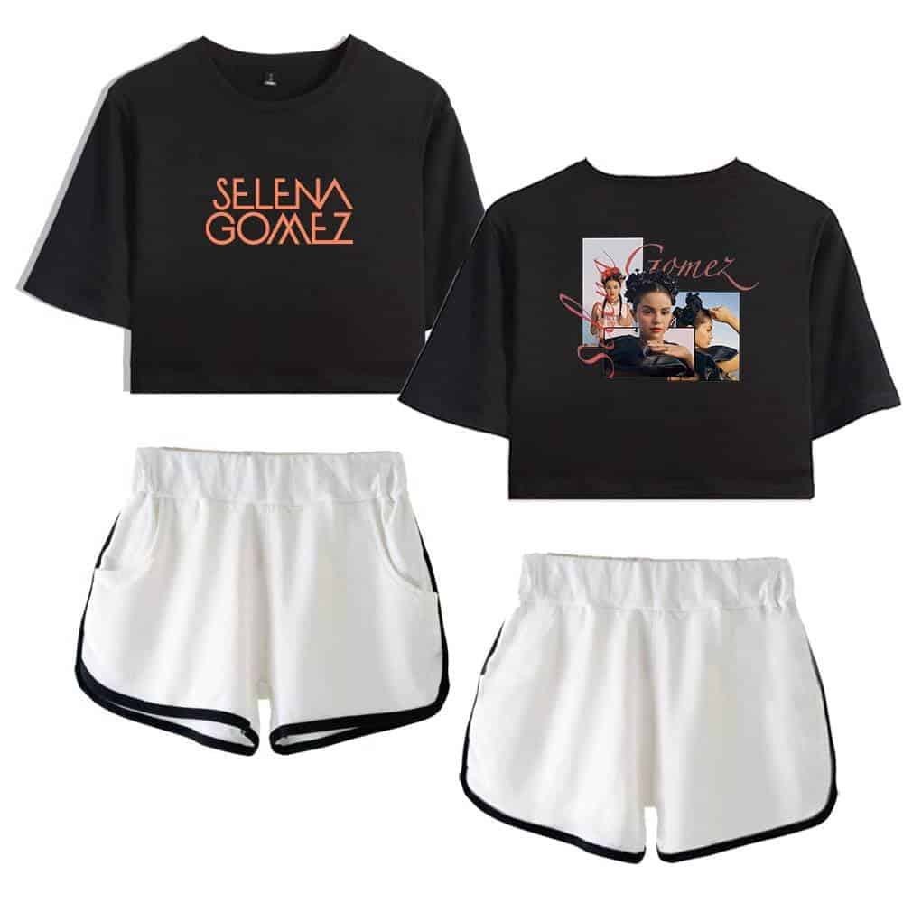 Selena Gomez merchandise set featuring a black crop top with her name and a printed image, paired with white athletic shorts with black trim. Perfect for fans to showcase their love for Selena Gomez.