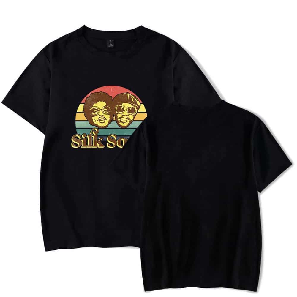 Silk sonic graphic t-shirt featuring animated portraits of two band members with retro sunset background, casual streetwear, black color, unisex fit, modern musical merchandise.