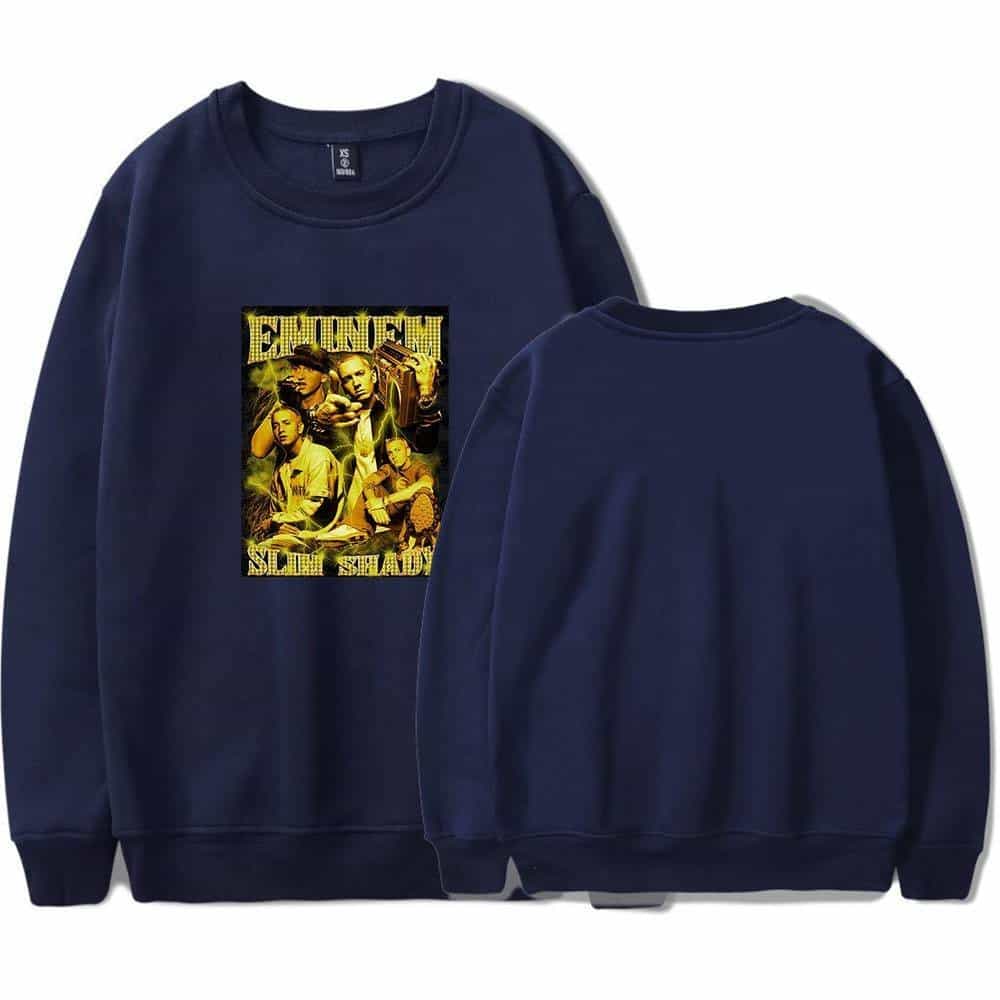 Eminem sweatshirt featuring a graphic print of the rapper in a yellow and black color scheme, with bold text "Eminem" and "Slim Shady" on the front. Perfect for music fans and streetwear style.