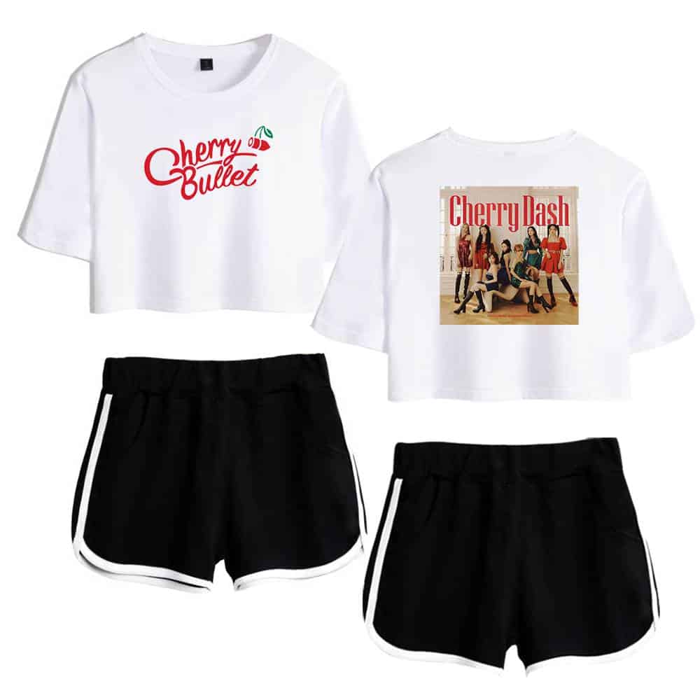 Cherry Bullet crop top and Cherry Dash graphic t-shirt with black athletic shorts featuring white side stripes, perfect for casual wear or fan merchandise.