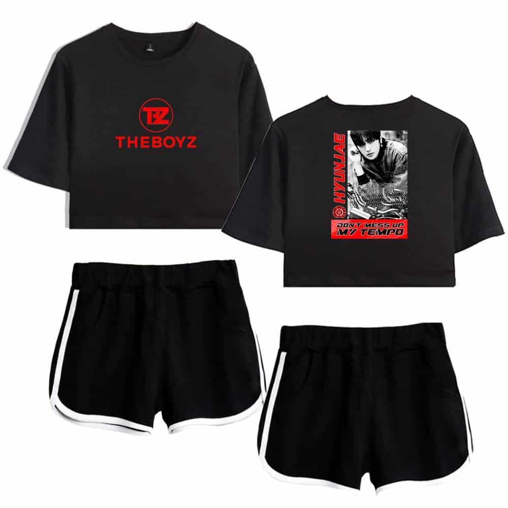 Black crop top sweatshirt with red "THEBOYZ" logo and a black mini skirt with white trim. The sweatshirt features bold text and graphic designs. Perfect for casual or streetwear style.