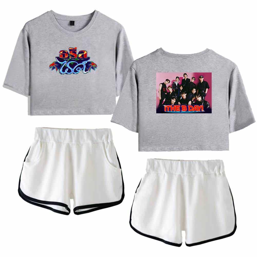 "Gray cropped sweatshirt with colorful logo in Thai script and front view. Another sweatshirt features a group photo of a male K-pop band with 'THE B DAY!' text. White athletic shorts with black trim included.".