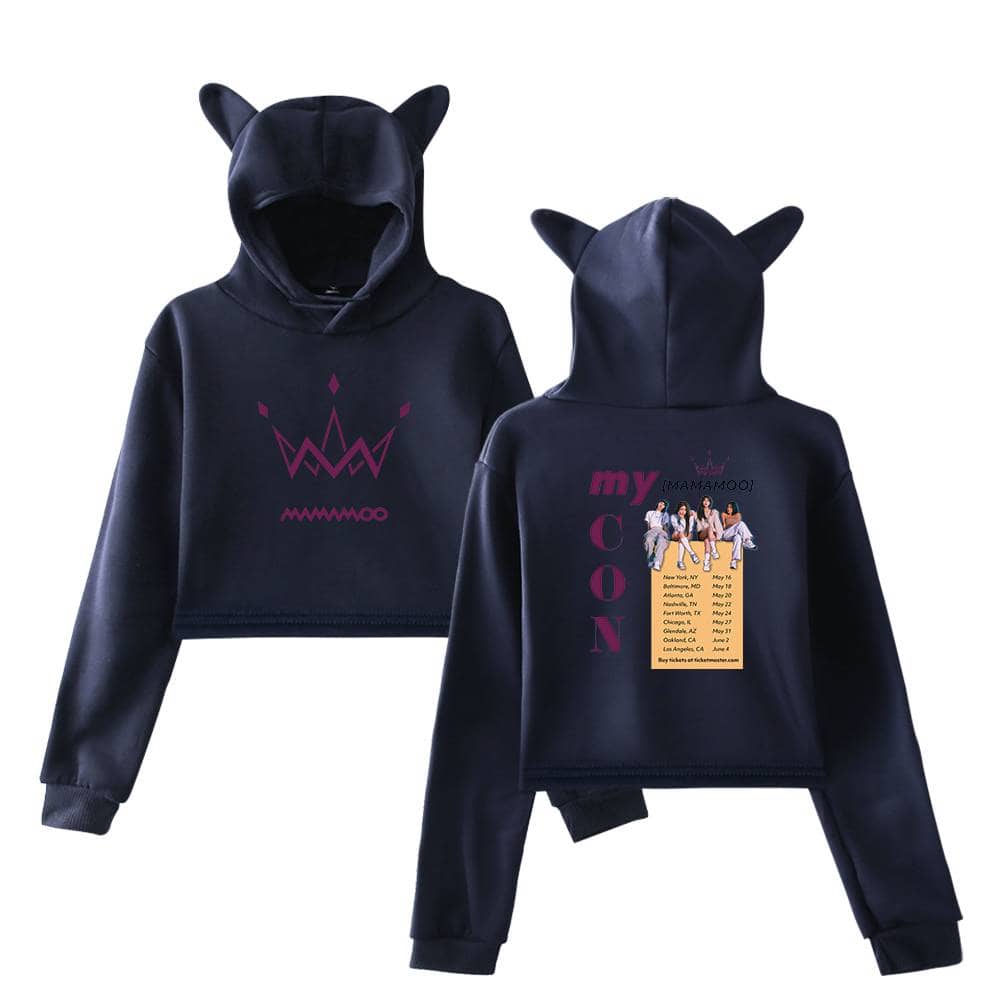 Dark navy blue cropped hoodie set featuring a bold pink crown graphic on the front and a back print of the K-pop group Mamamoo, complete with tour dates and an illustration of the group members, with cat ear hood details.