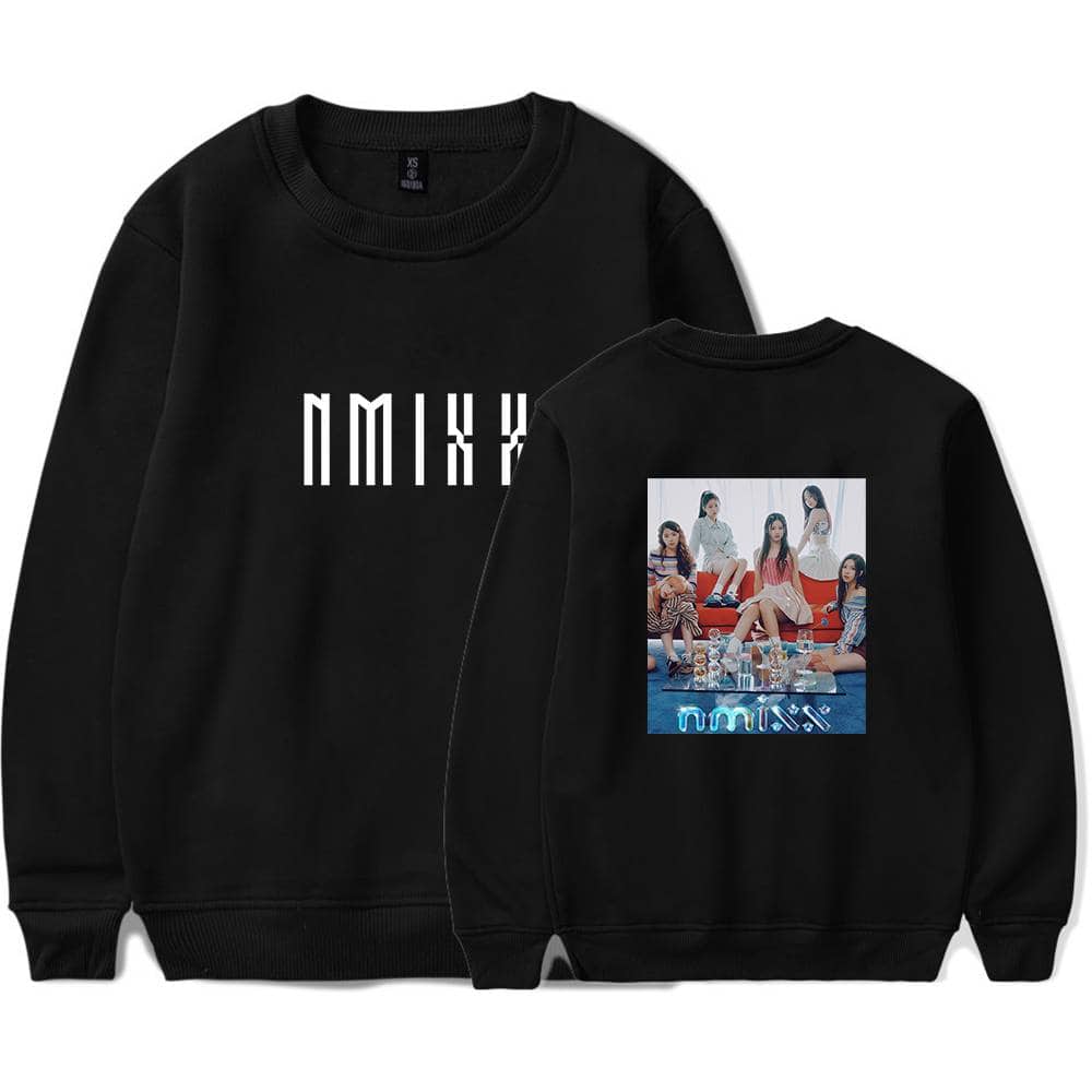 Black crewneck sweatshirt featuring a group photo of five women with "nmixx" neon-lit text at the bottom, perfect for K-pop fans or casual wear.