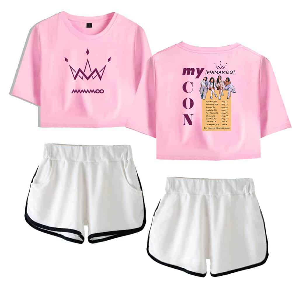 Pink oversized t-shirt featuring a minimalist crown graphic and a back print with tour dates and images of the K-pop girl group Mamamoo. Pairing with white athletic shorts with black trim for a casual look.