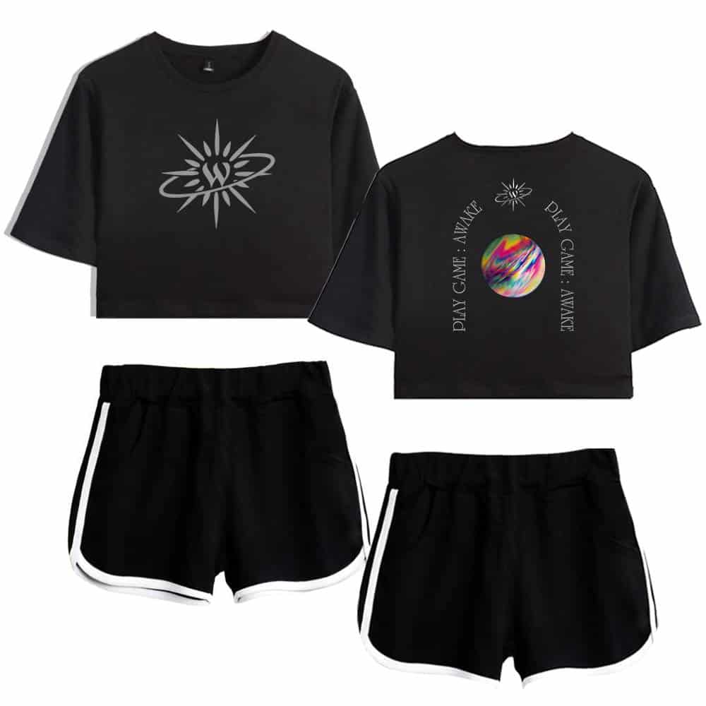 Black crop top featuring a stylized sun graphic on the front and a colorful planet with the phrase "PLAY GAME: AWAKE" on the back. Paired with black athletic shorts with white trim.