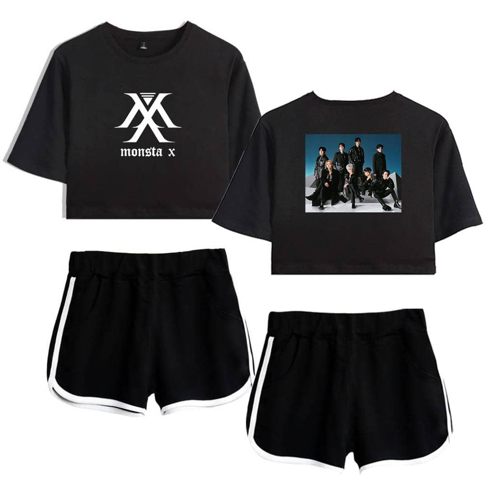 Monsta x black crop top with band logo and group photo on the back, paired with black athletic shorts with white trim, perfect for casual wear or fan merchandise.