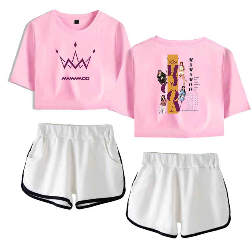 Pink graphic crop top with a crown design, paired with white athletic shorts with black trim, featuring a casual sporty style perfect for streetwear and outdoor activities.