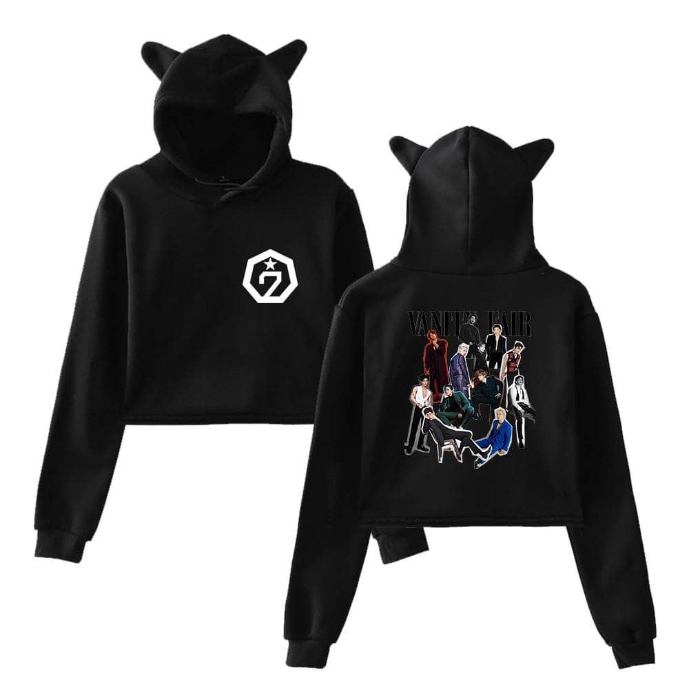 Black hoodie featuring a "7" logo on the front and a "VANITY FAIR" group illustration on the back with character graphics, stylish and casual for fans of fashion and pop culture.