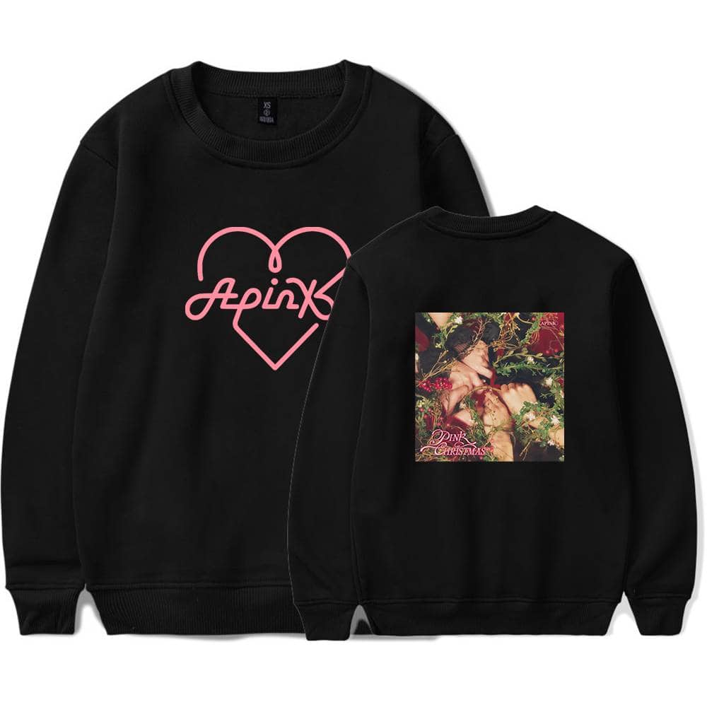 Apink Christmas sweater with pink neon heart and album cover print featuring a festive, floral-themed design, perfect for fans and holiday celebrations.