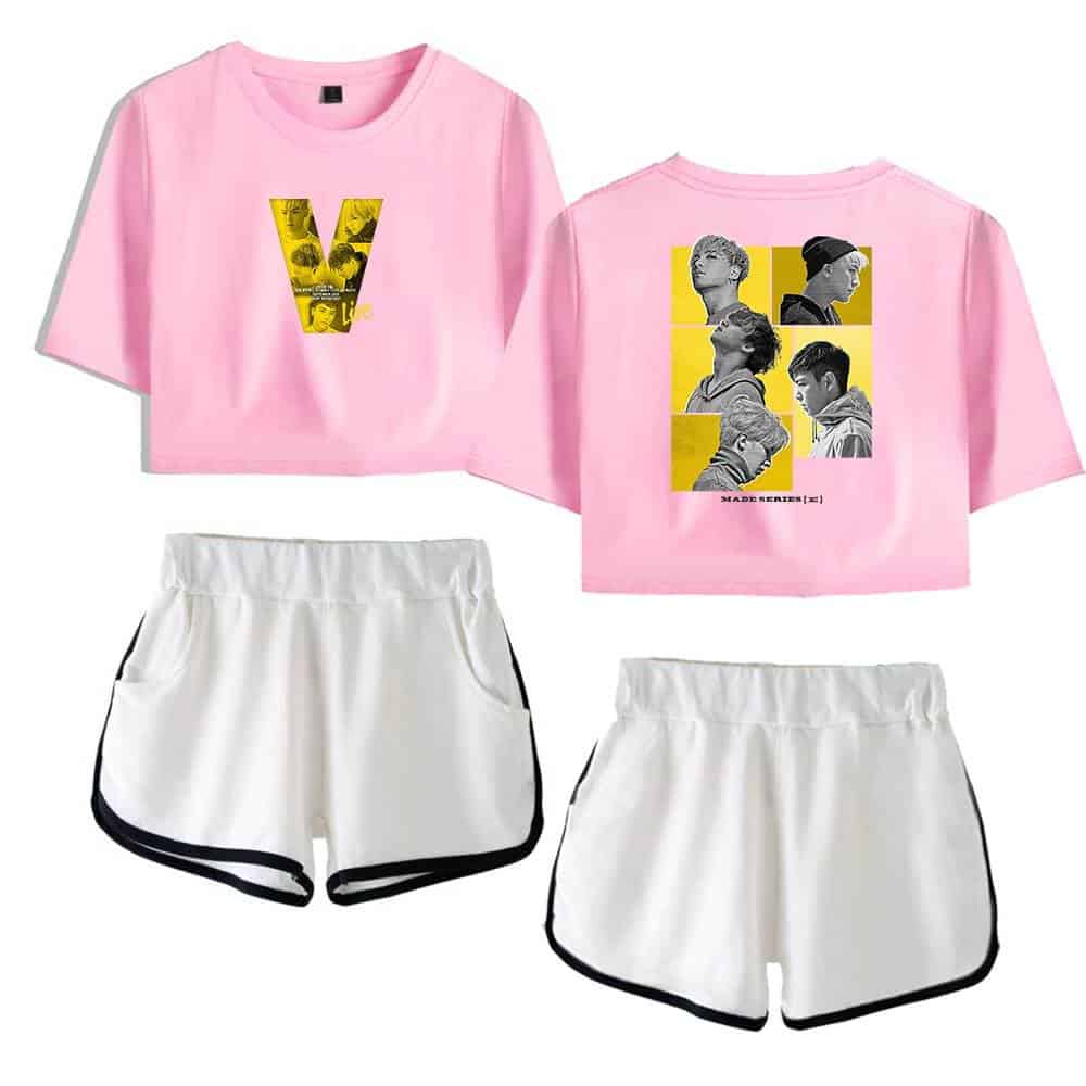 V-shaped pink and yellow graphic t-shirt with casual white shorts, ideal for stylish streetwear or workout outfits.