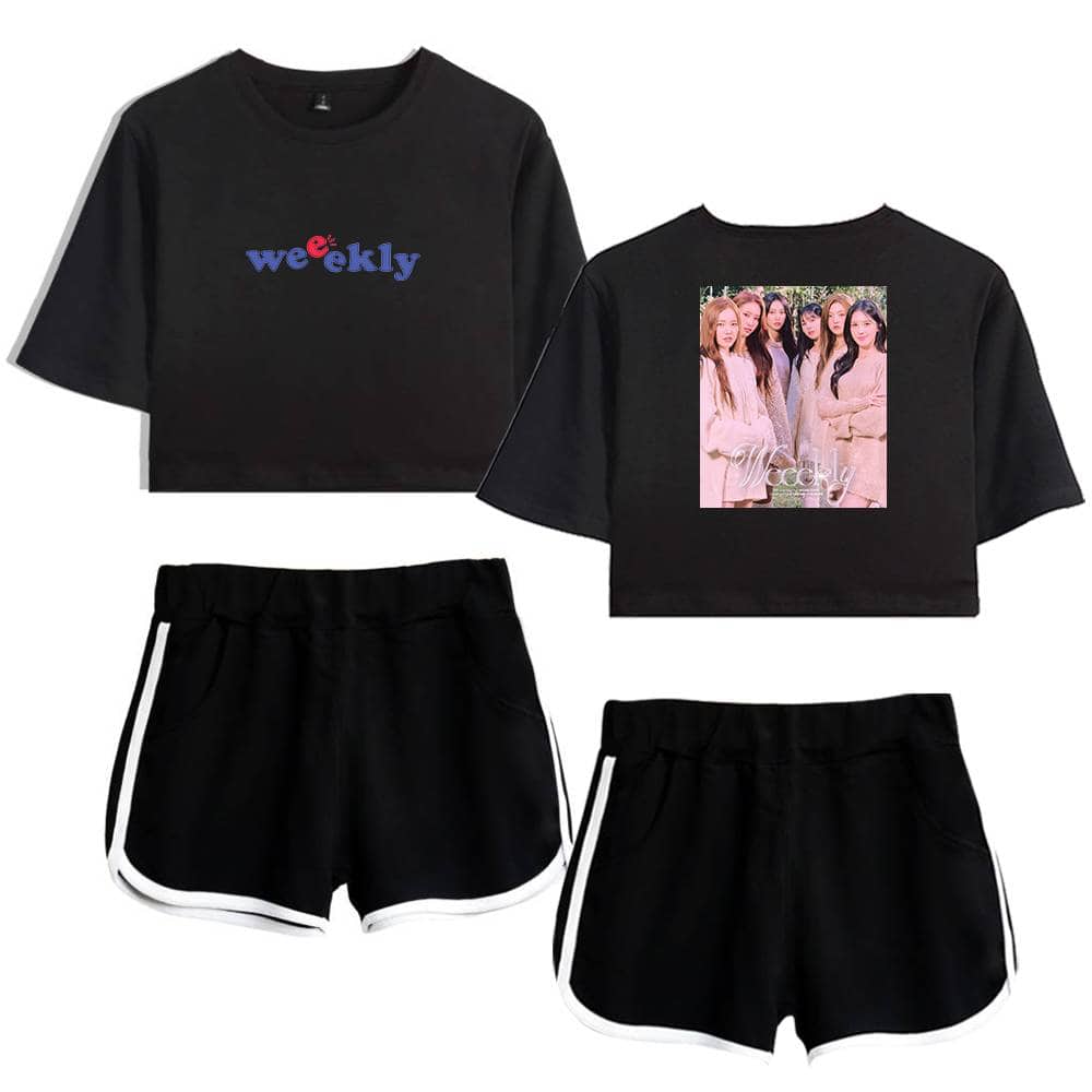 WeekLy black crop top with colorful text and a photo of a girl group on the back, paired with black athletic shorts with white trim, casual and trendy merchandise for fans.
