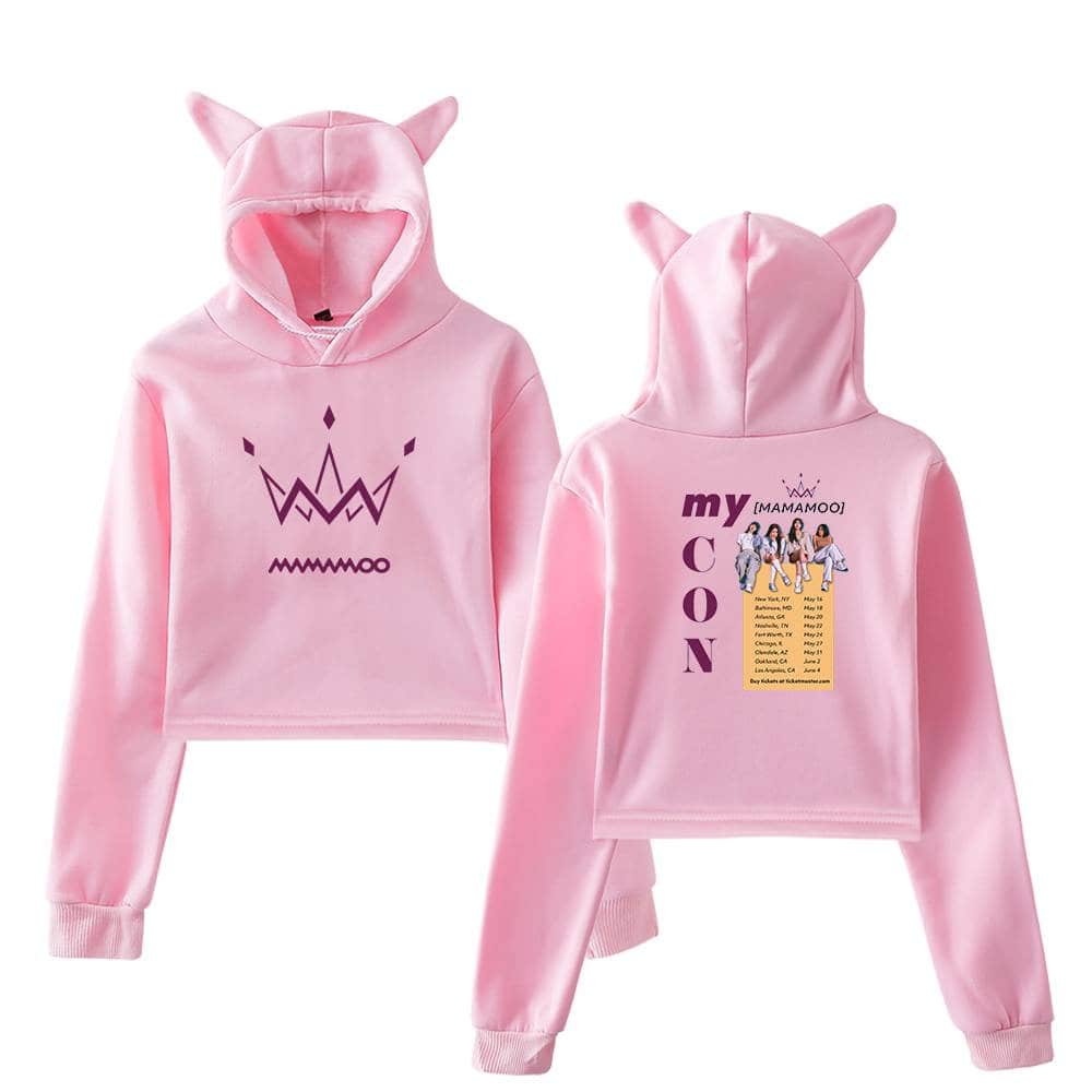 Pink K-pop group MOMOLAND hoodie with cat ears and front crown graphic, perfect for fans or casual wear. Features vibrant colors and comfortable fabric, ideal for concert or everyday merchandise.