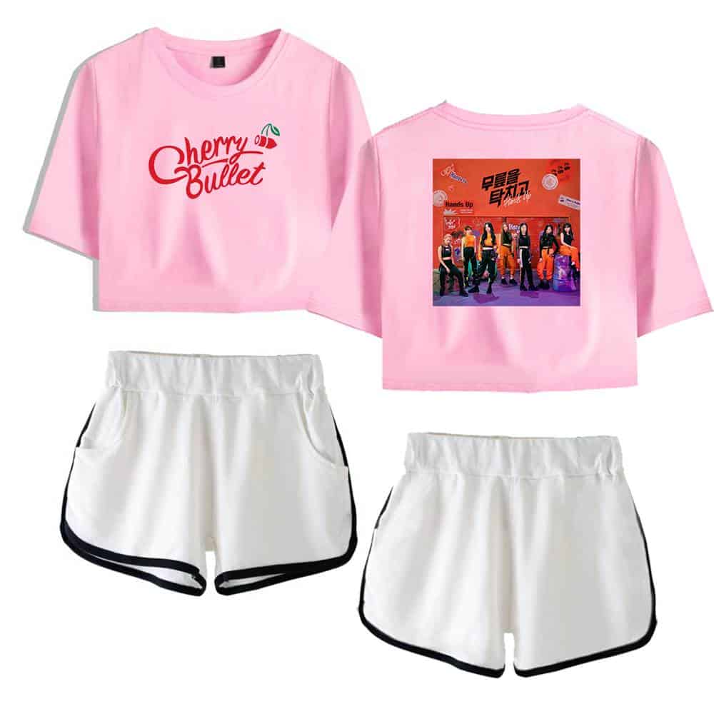 Cherry Bullet pink cropped T-shirt with graphic back print and white running shorts with black trim for fans of the K-pop group.