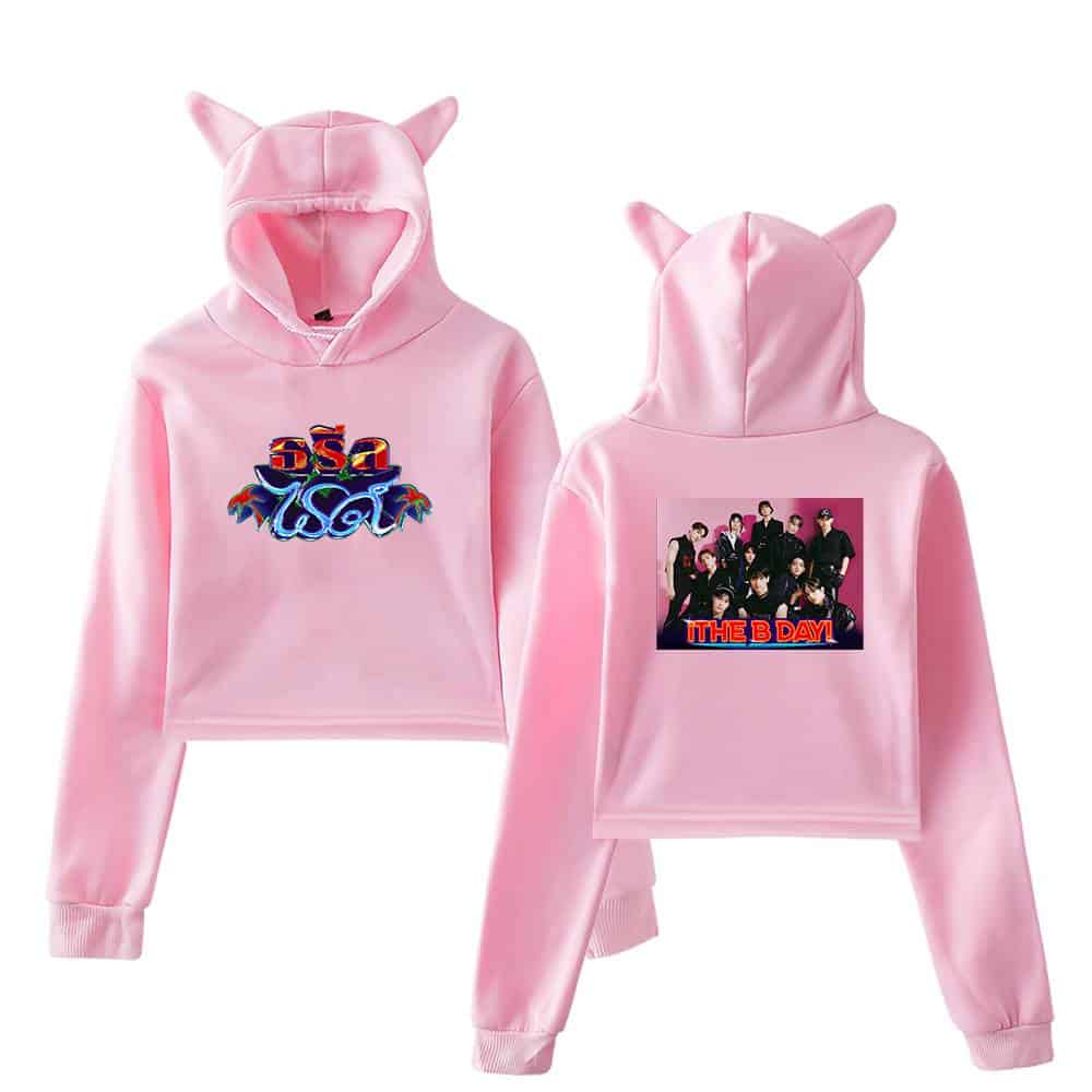 Soft pink hoodie and sweatpants set featuring a playful, cartoonish logo on the front and a group photo with "THE B DAY!" text on the back, complete with adorable cat ears on the hood.