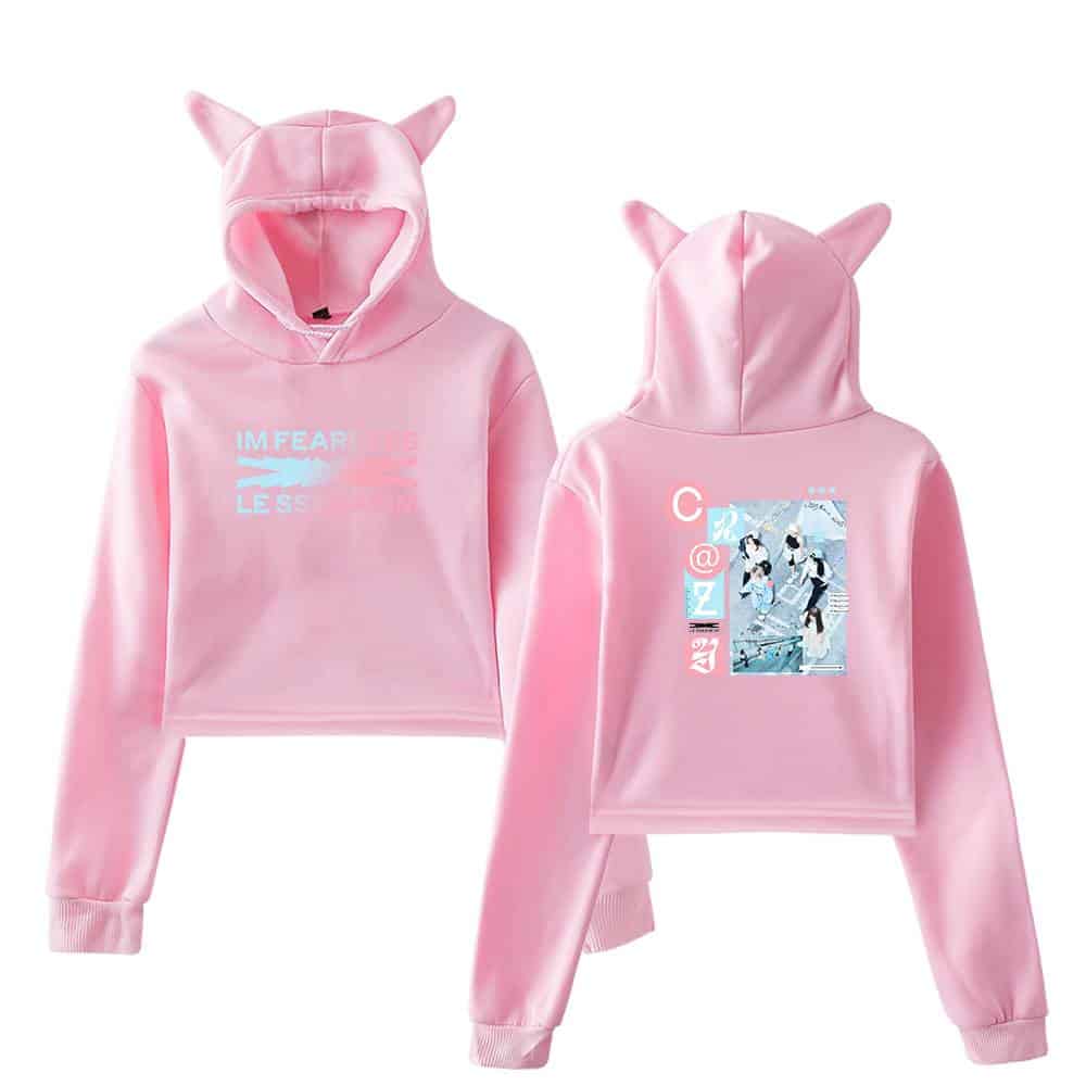 Soft pink hoodie and sweatpants set with playful graphic designs and cute animal ears on the hood, perfect for casual wear and making a fun fashion statement.