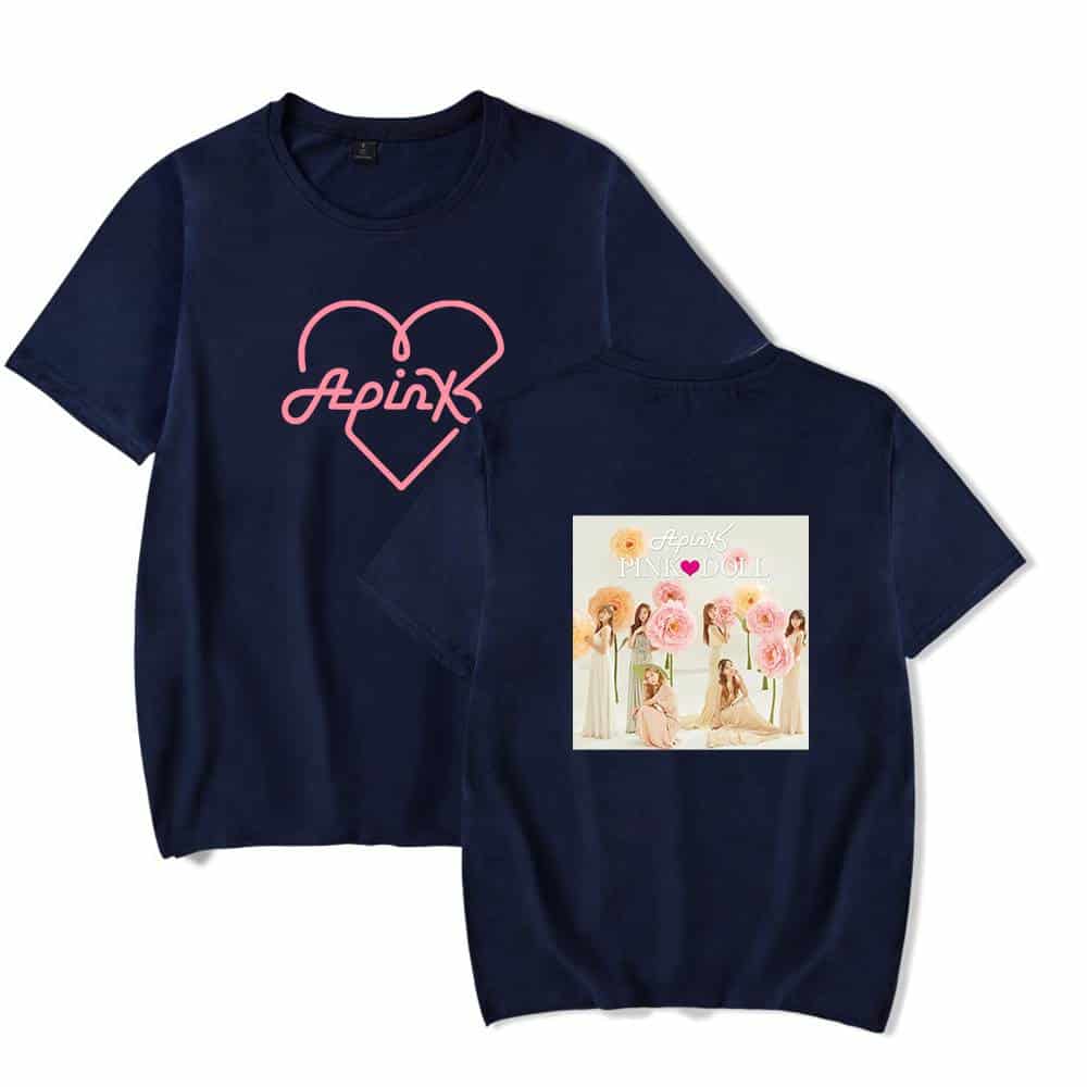 Pink outlined heart with "Apink" text inside, on a dark navy t-shirt.