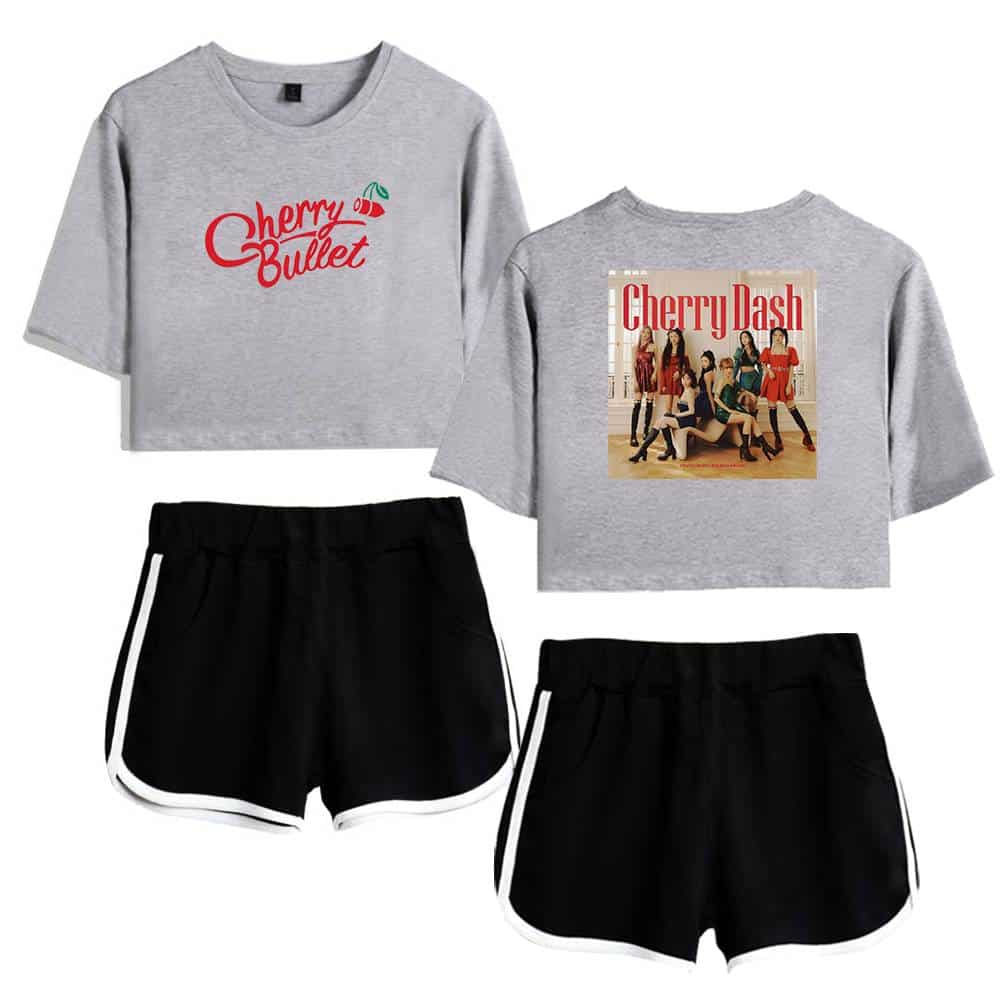 Cherry Bullet cropped sweatshirt with the band’s logo on front and photo print on back, paired with black athletic shorts with white piping, perfect for fans of the K-pop group.