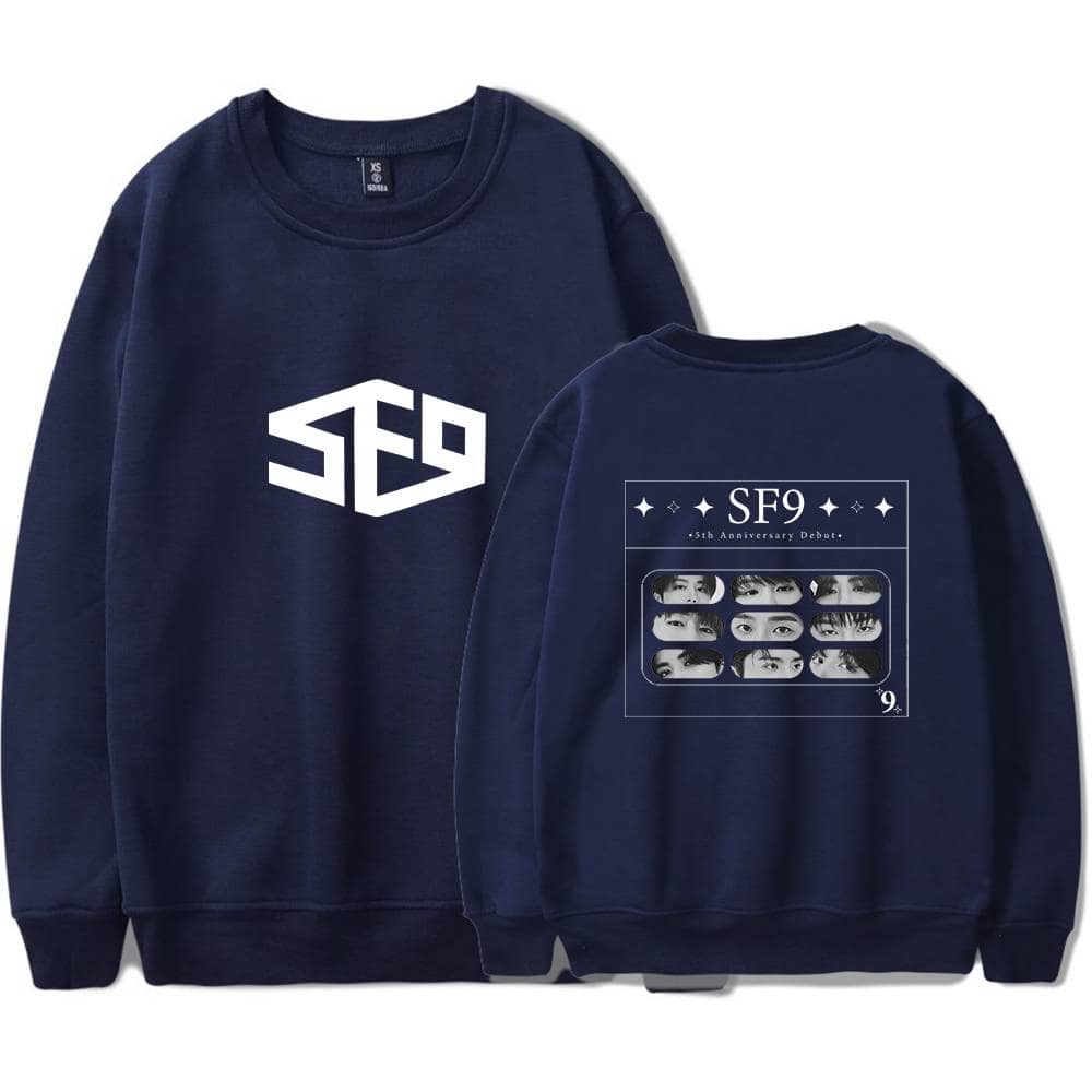 SFD SF9 5th Anniversary Debut sweatshirt, navy blue with bold logo on front and graphic design featuring band members on the back. Perfect for fans of the K-pop group SF9.