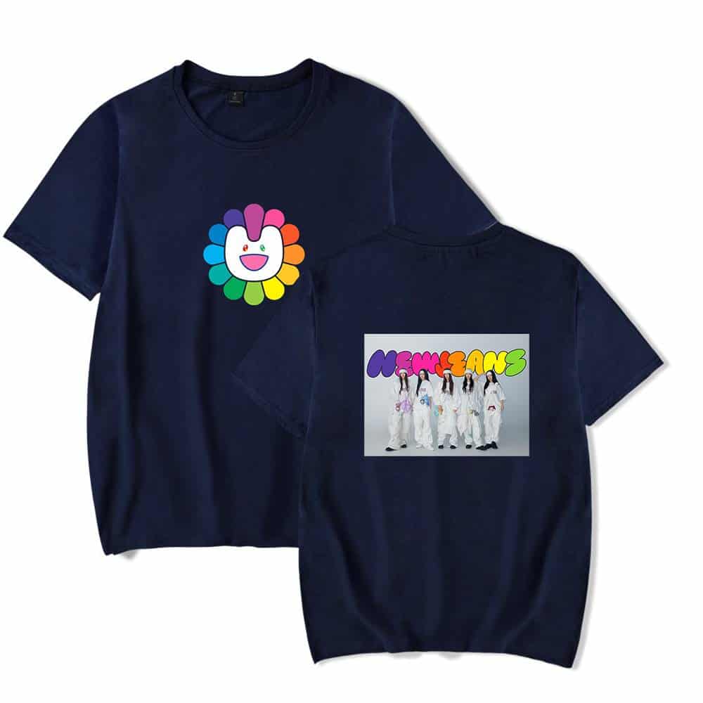 Colorful flower face logo on navy T-shirt with band members and vibrant text design.