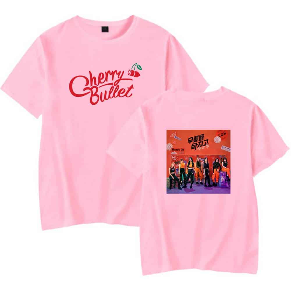 Cherry Bullet pink graphic t-shirt merchandise with band logo and group photo, casual style.