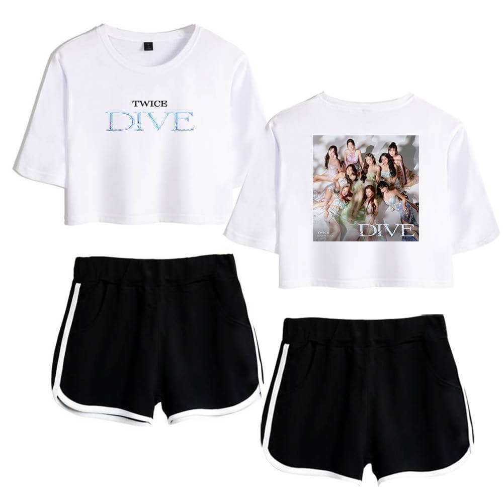 Diva TWICE merchandise set featuring a white graphic crop top with "TWICE DIVE" text and a photo of the group, paired with black athletic shorts with white trim. Perfect for fans and casual wear.
