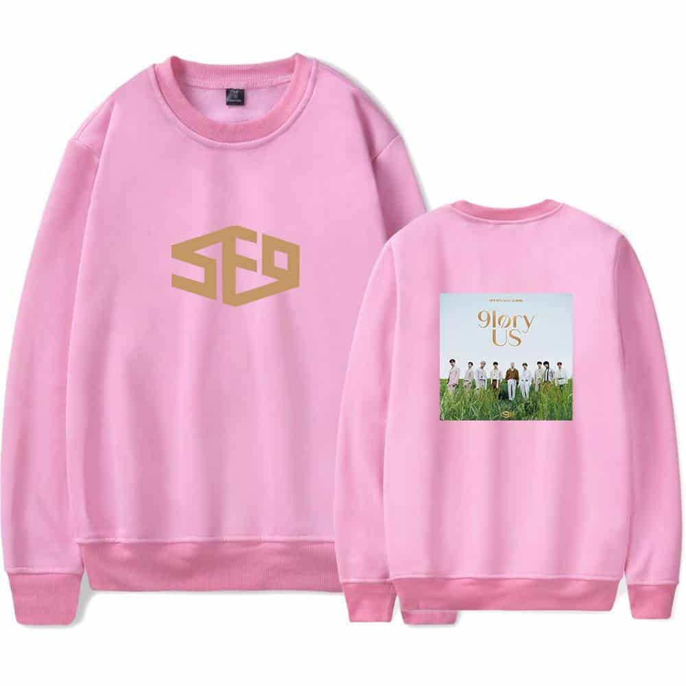 SEC pink sweatshirt with a gold logo on the front and a group photo design on the back, perfect for fans and merchandise collectors.