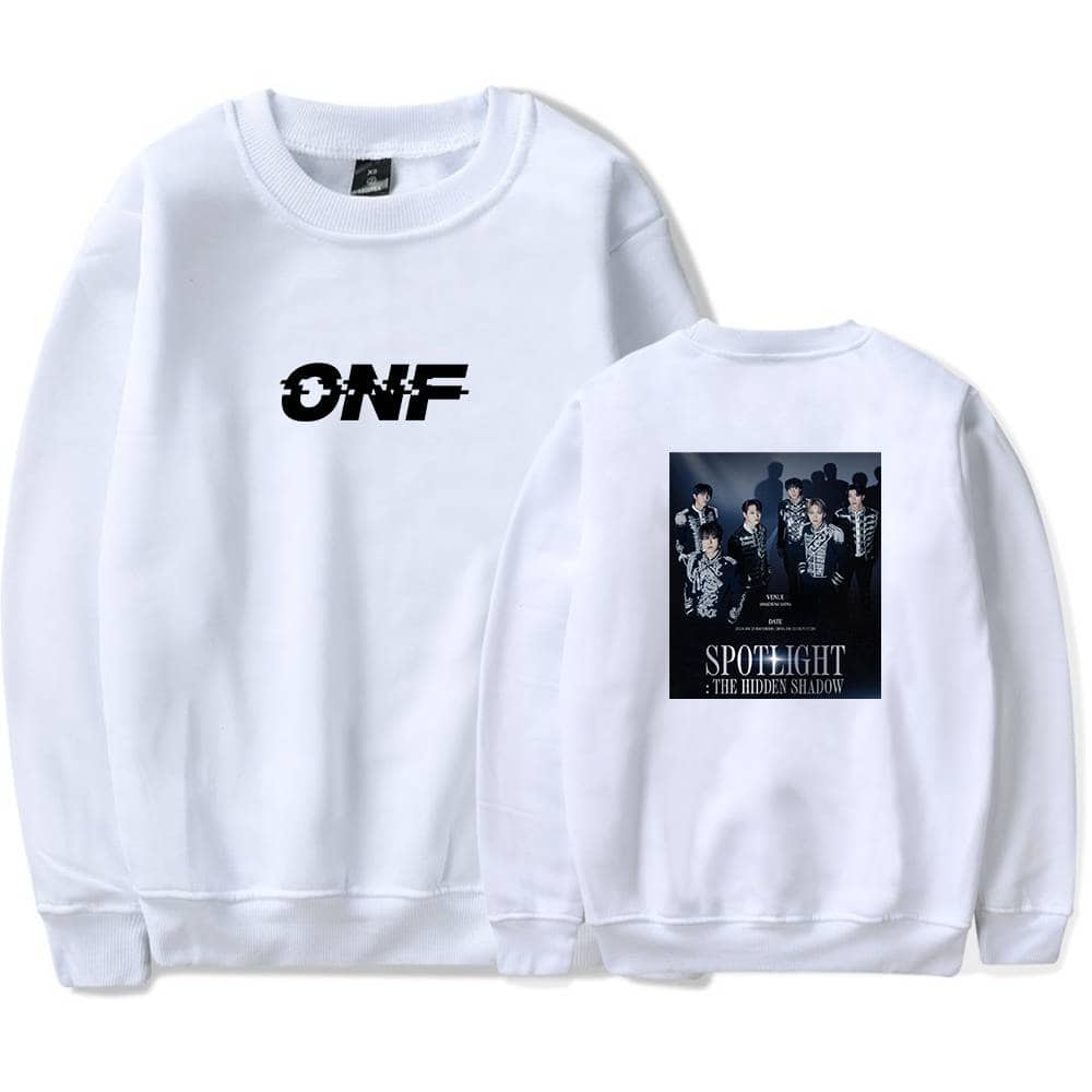 ONF sweatshirt with bold front logo and band image on the back, featuring a darkly lit photo of the group members and the text "SPOTLIGHT: THE HIDDEN SHADOW". Perfect for fans of ONF and K-pop merchandise.