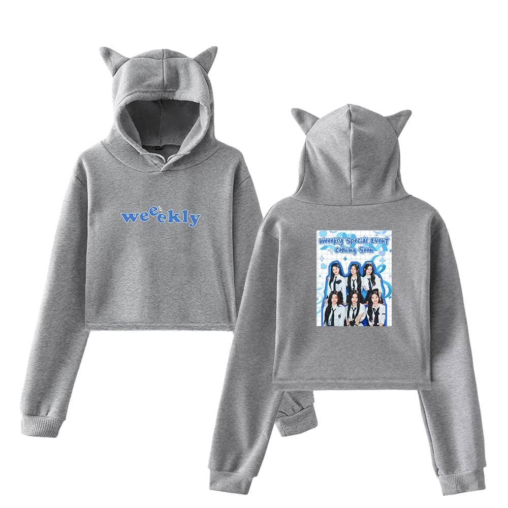 Comfy grey hoodie with playful cat ears on the hood, featuring "weekly" text on the front and a colorful graphic print of a girl group with "Special Event Coming Soon" text on the back, perfect for fan merchandise.