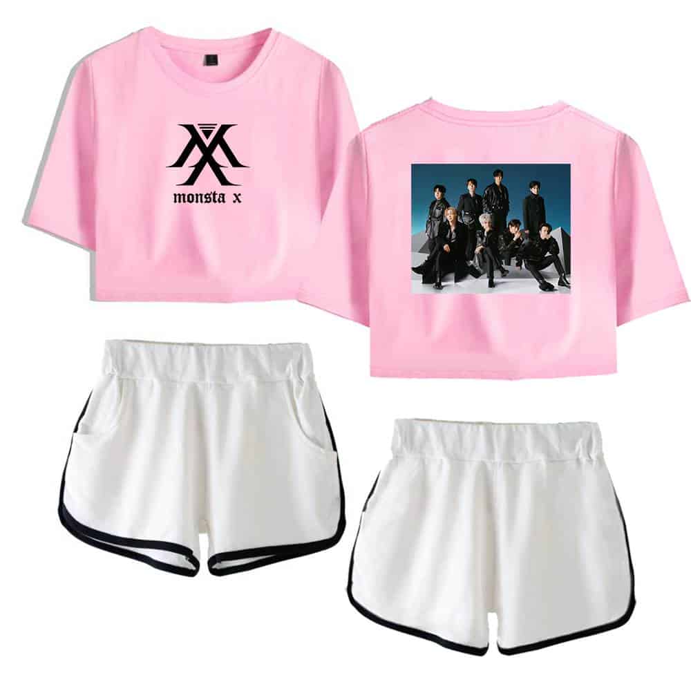 Pink Monsta X cropped t-shirt with logo on front and group photo on back, paired with white athletic shorts with black trim. Perfect for fans and casual wear.