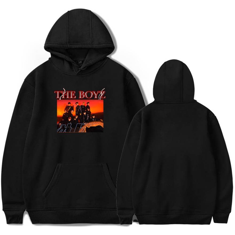 Boy band hoodie featuring a graphic of The Boyz with a sunset background, perfect for fans of the K-pop group. Comfortable black sweatshirt with front pocket and bold design.