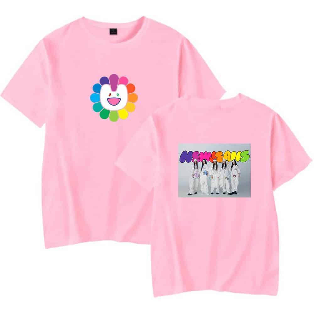 Colorful bunny face with rainbow petals design on a pink T-shirt.