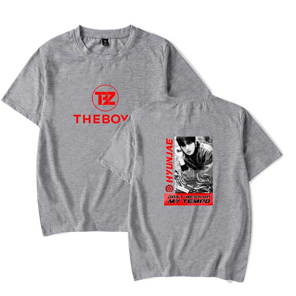 Tz the boy logo and a black-and-white photo of a woman on gray T-shirt, with red text and graphic elements, illustrating trendy streetwear merchandise.