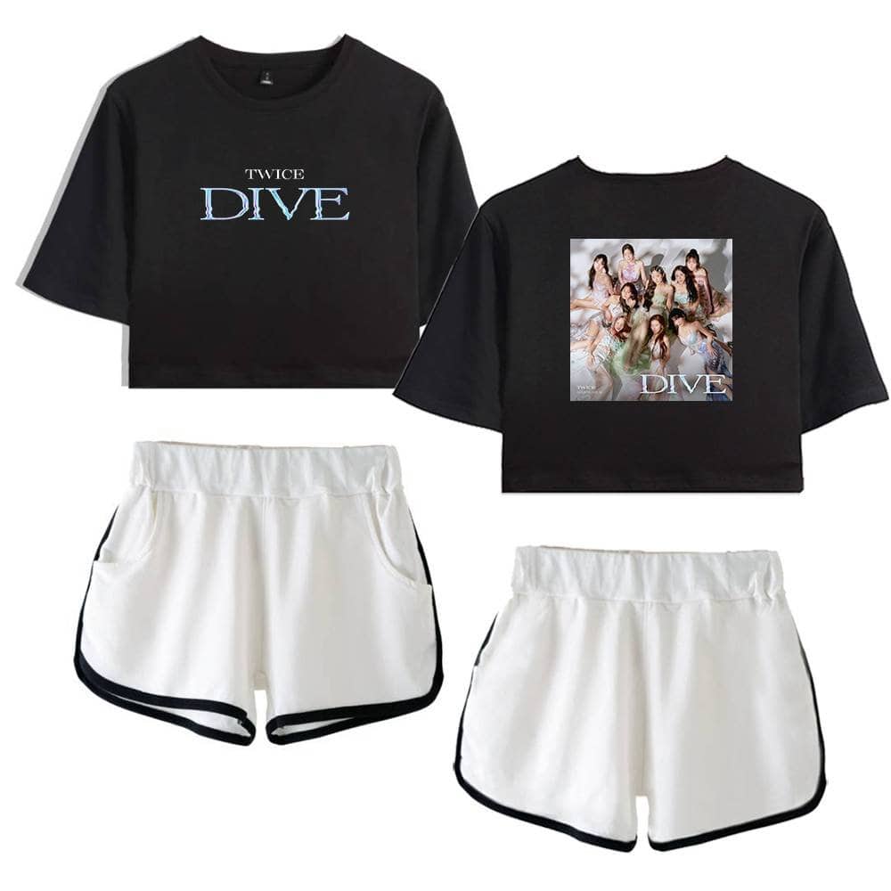 Diva K-pop girl group's merchandise set including two black cropped t-shirts featuring the group's name and a group photo, paired with white athletic shorts with black trim.