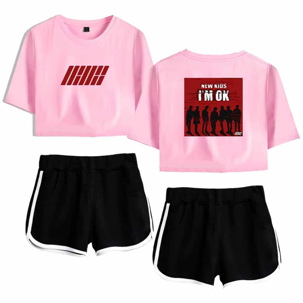 IHJH pink cropped t-shirt with red graphic print and black athletic shorts with white trim for a trendy and sporty look. Perfect for casual wear or street style outfits.