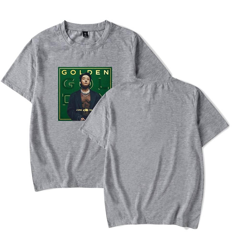 Bold graphic T-shirt featuring a stylish woman illustration with "GOLDEN" text, perfect for streetwear or casual outfits. Made from soft, comfortable fabric, available in versatile gray.