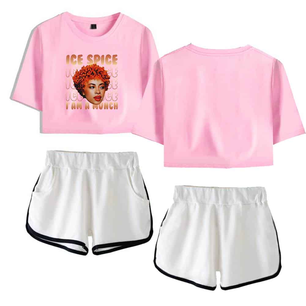 Bright pink cropped T-shirt featuring a graphic of a woman with curly hair and the text "ICE SPICE" and "U ARE MY WITCH." Paired with white shorts with black trim for a trendy, casual look.