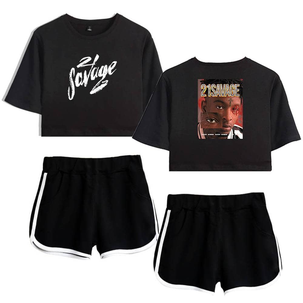 2. Black crop top with "2SAVAGE" graphic text and a black athletic shorts set with white piping, trendy and casual.