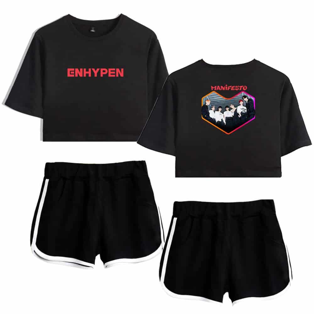 ENHYPEN merchandise set featuring a black crop top with bold red "ENHYPEN" text on the front and a back design with the word "Manifesto" along with a colorful, stylized group photo. Matching black shorts with white trim.