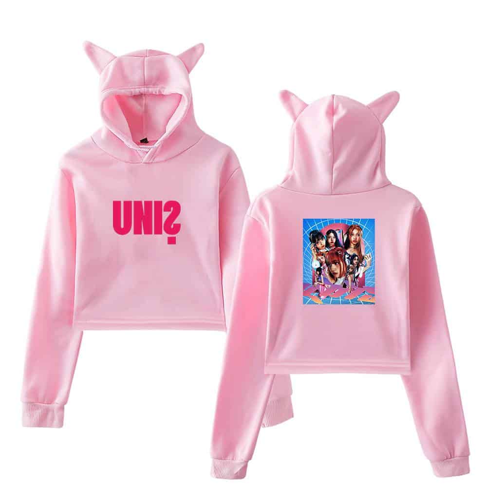 UNIS pink hoodie featuring a graphic of a girl band on the back and bold "UNIS" text on the front, with playful animal-ear hood design. Perfect for fans of the music group or stylish casual wear.
