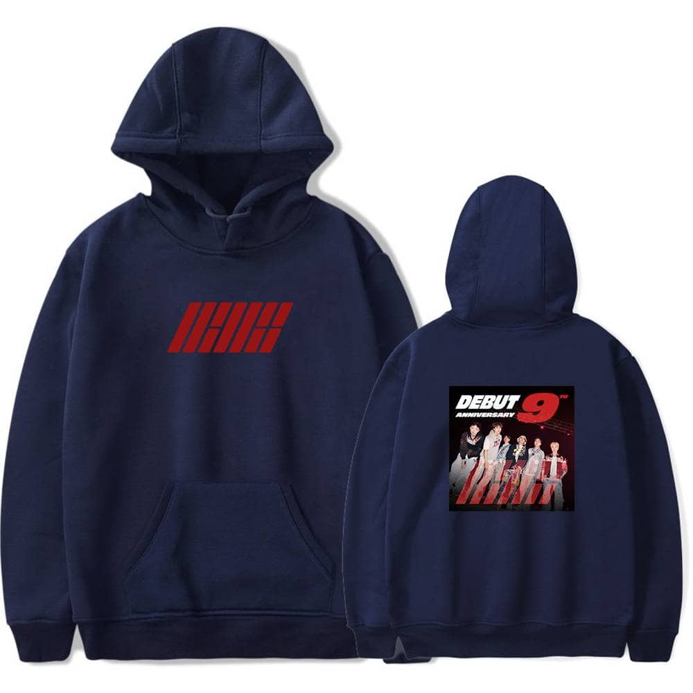 IHH! logo in red on the front of a navy blue hoodie, and a back print featuring the debut 9 album cover with a group of five people, blending music merchandise and casual fashion.