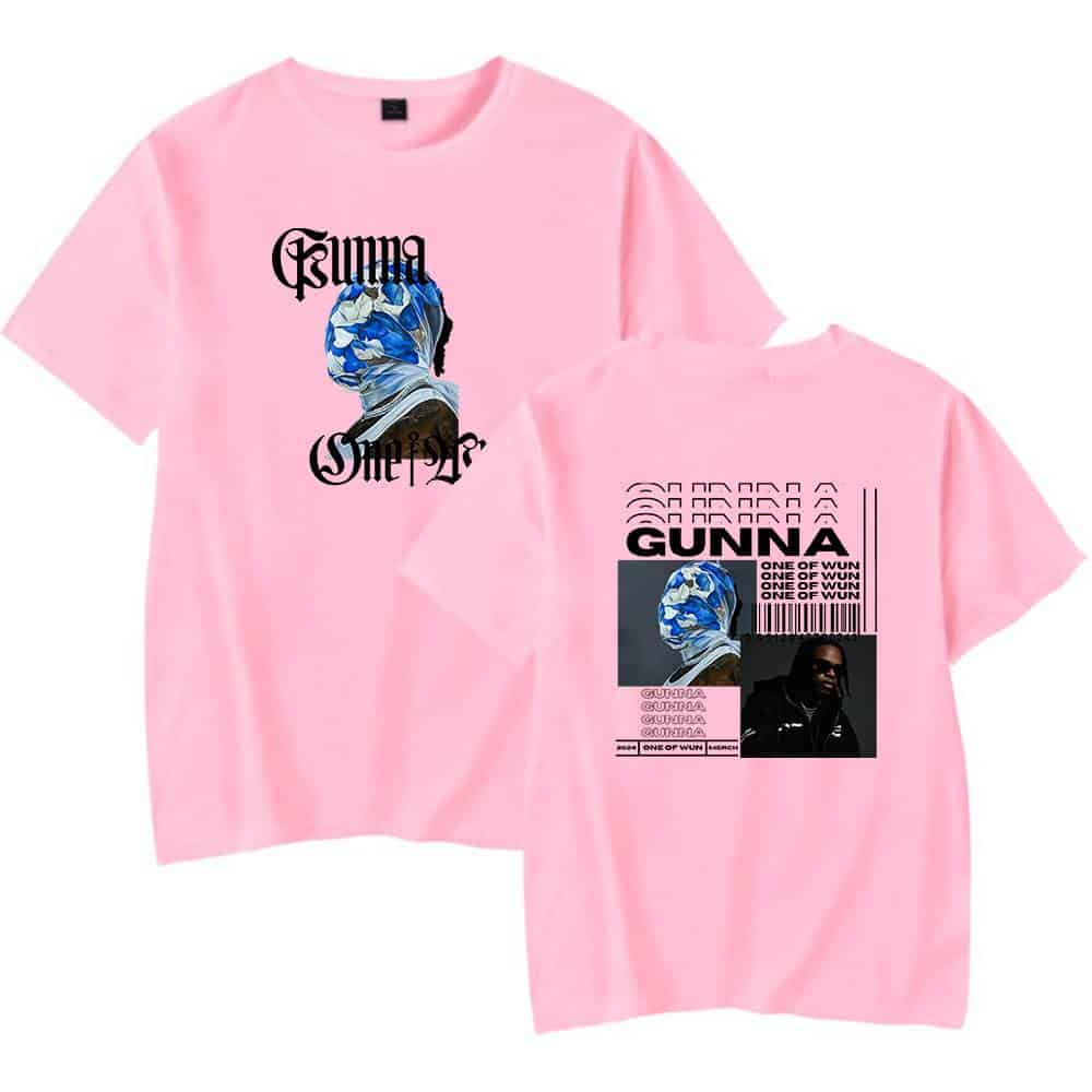 Band T-shirt featuring artwork inspired by Gunna's music, with a pink background and bold graphic design elements. Perfect for fans of hip-hop streetwear and music merchandise.