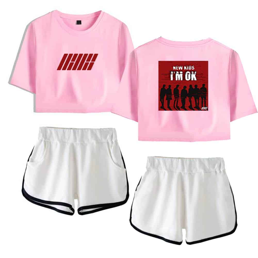 IHHK pink cropped t-shirt with red graphic design featuring silhouettes of people and text, paired with white athletic shorts with black trim. Perfect for casual or sportswear fashion.