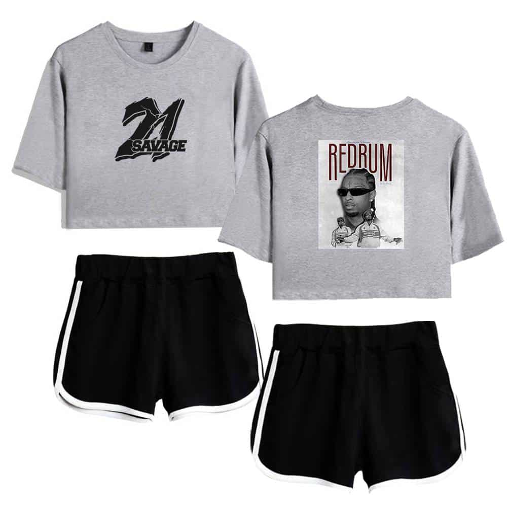 1. grey crop top with "21 SAVAGE" graphic and black shorts with white trim.