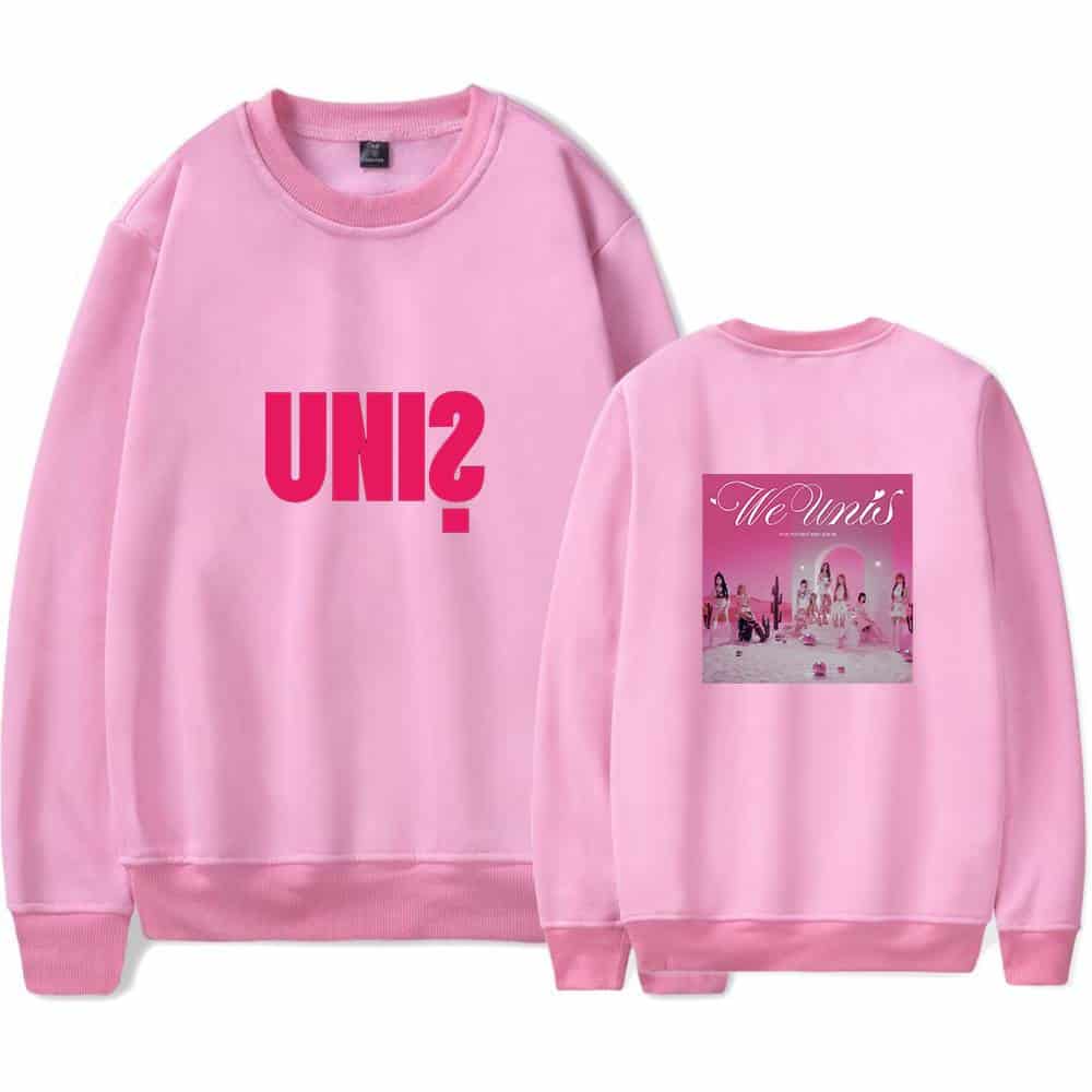 UNI2 pink sweatshirt with bold text on the front and a graphic design on the back, featuring the words "We Uni's" and a desert scene with women.