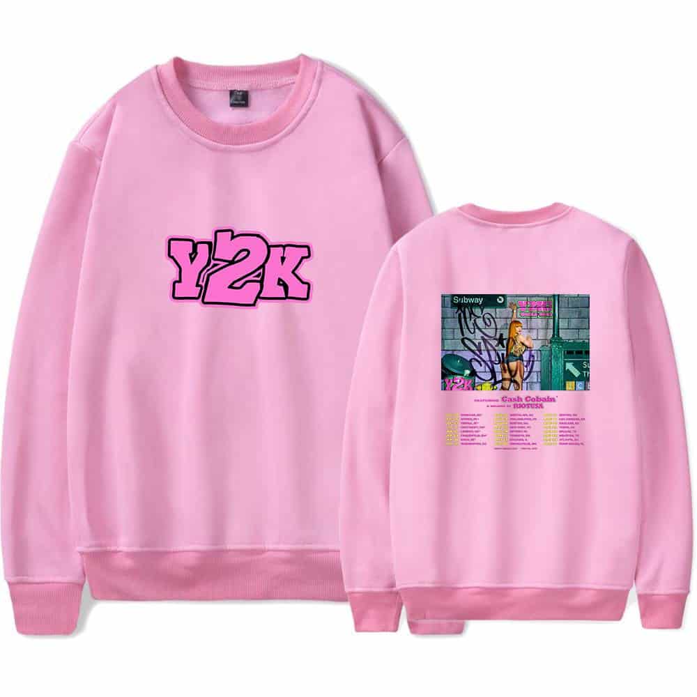 Y2K pink sweatshirt with graffiti and subway art design, featuring a retro style inspired by early 2000s fashion and streetwear culture.