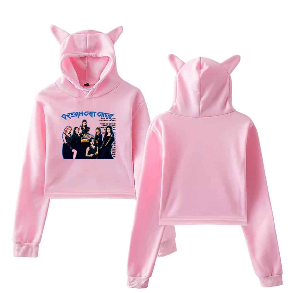 Dreamgazer girl band pink hoodie set with cat ears hood design, perfect for fans of the music group and streetwear fashion enthusiasts. Soft, comfortable material with graphic print on front.