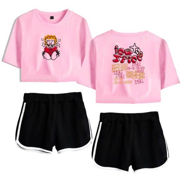 Cute pink crop top featuring a cartoon character reading a book, paired with stylish black shorts with white side stripes. Perfect for casual, trendy summer outfits.