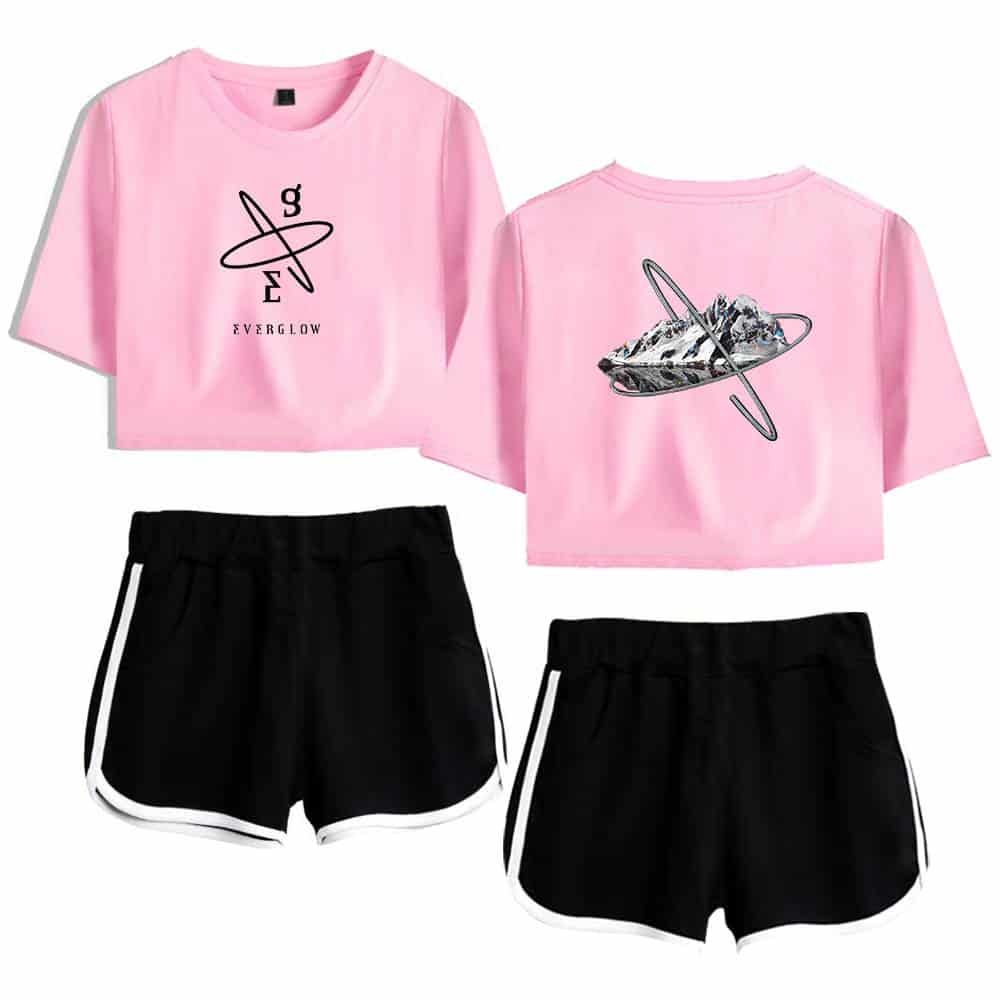 Cosmic galaxy print pink cropped t-shirt with black shorts, space-themed merchandise, trendy casual wear, streetwear style.